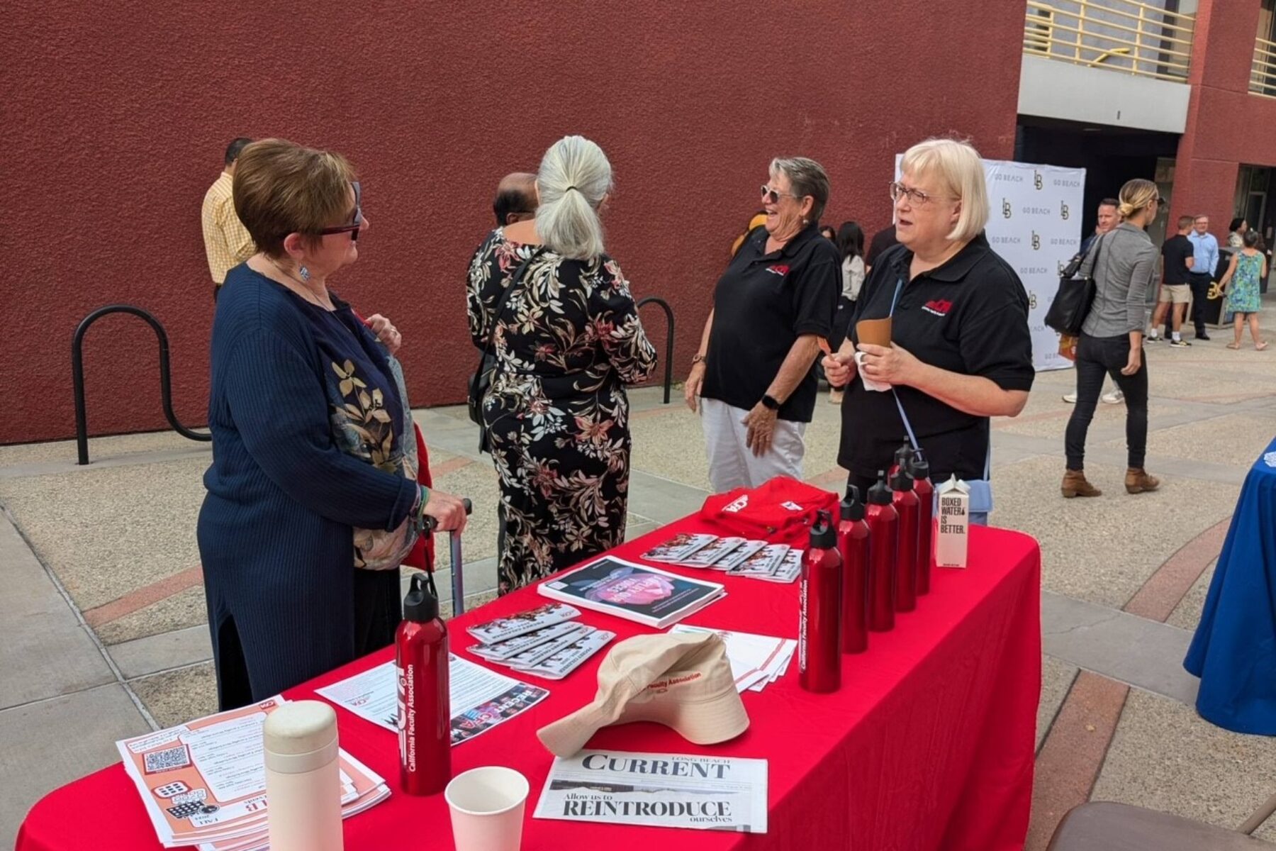 a group of people at a tabling