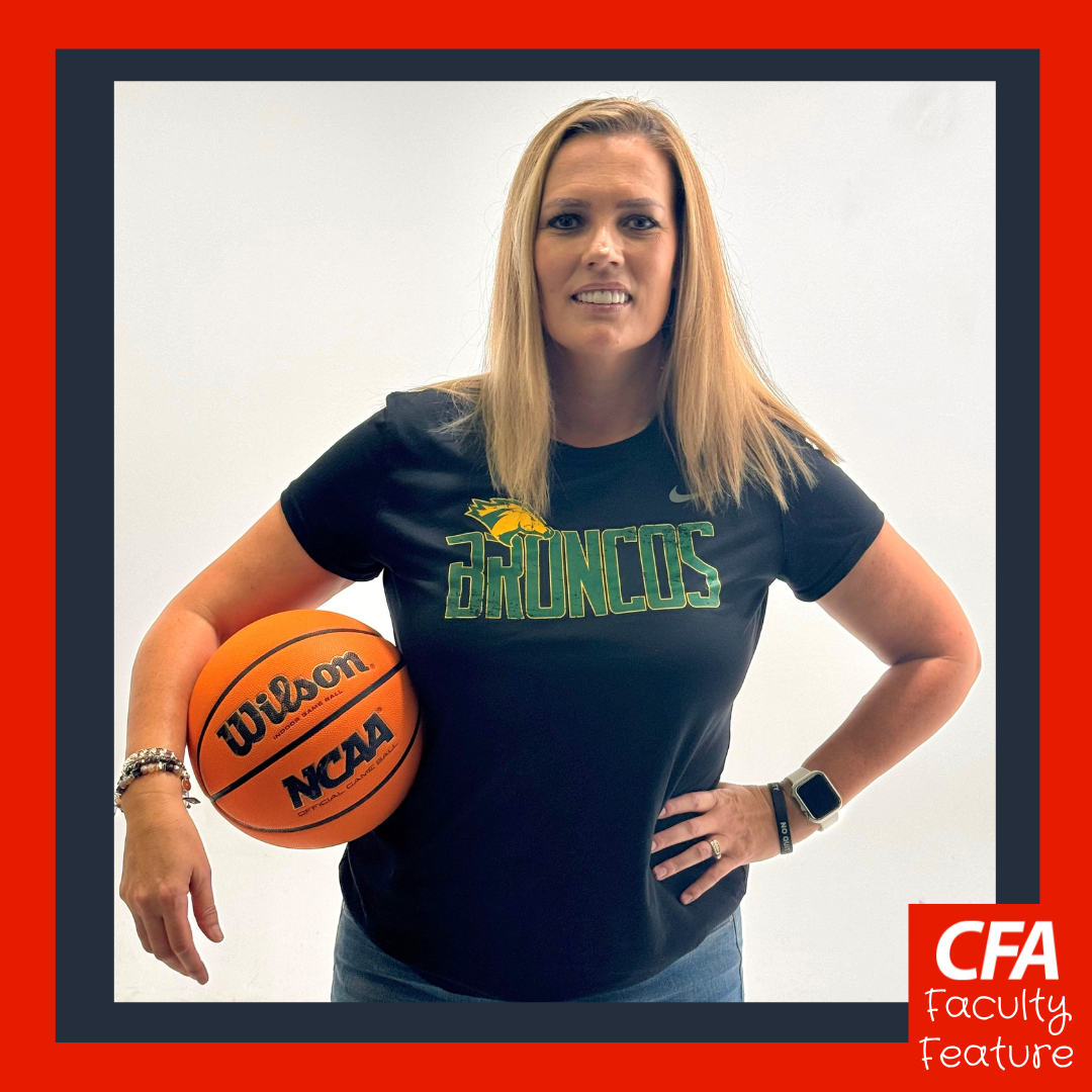 Photo of woman wearing a Broncos shirt and holding basketball.